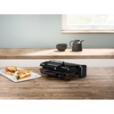 Bosch TCG3323 contact grill — grilled sandwiches on a kitchen counter | 2000 W, 310 × 220 mm, Black — شواية بوش TCG3323 — سندوتشات مشوية على مطبخ | 2000 وات، 310 × 220 مم، أسود