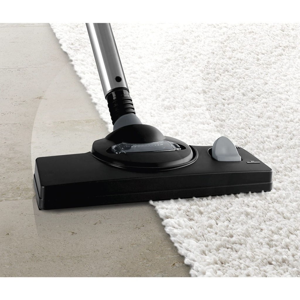 Bosch BWD420HYG wet and dry vacuum — hard floor nozzle on a rug edge | 2000 W, HEPA, White × Turquoise — مكنسة بوش BWD420HYG — فرشاة الأرضيات الصلبة على حافة السجاد | 2000 وات، هيبا، أبيض × تركواز